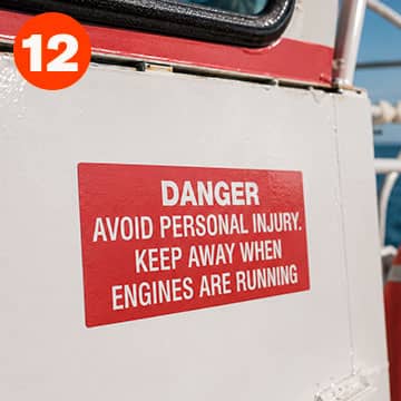 Danger label on marine engine housing