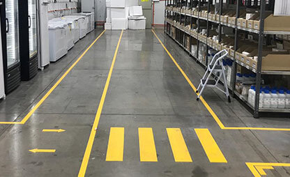 Floor marking crosswalk indicates where to cross