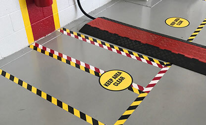 Well marked floor using hazard tape and keep area clear floor signs