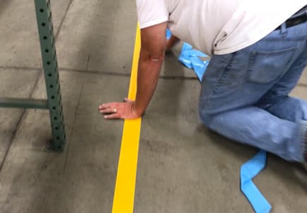 Secure to floor and tamp with weight